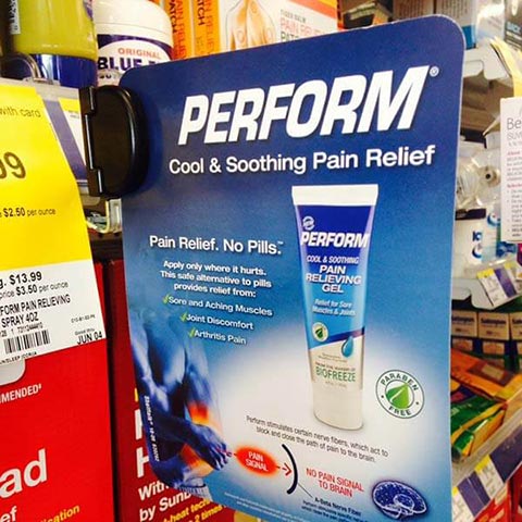 Branded retail aisle violator for Perform products